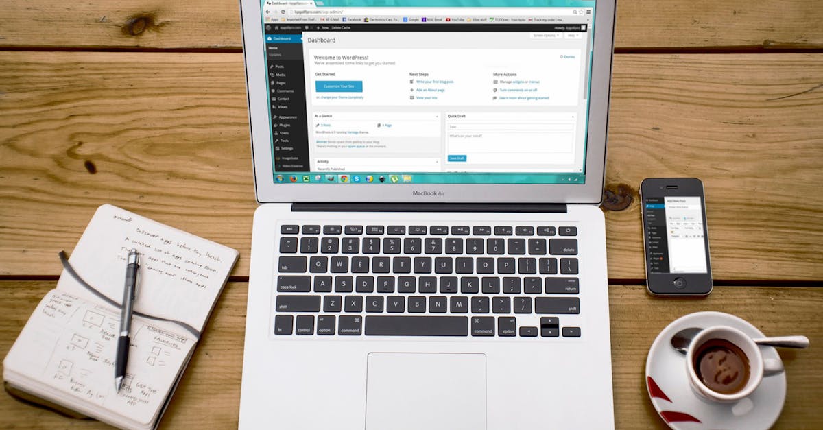 A WordPress update checklist open beside a laptop.