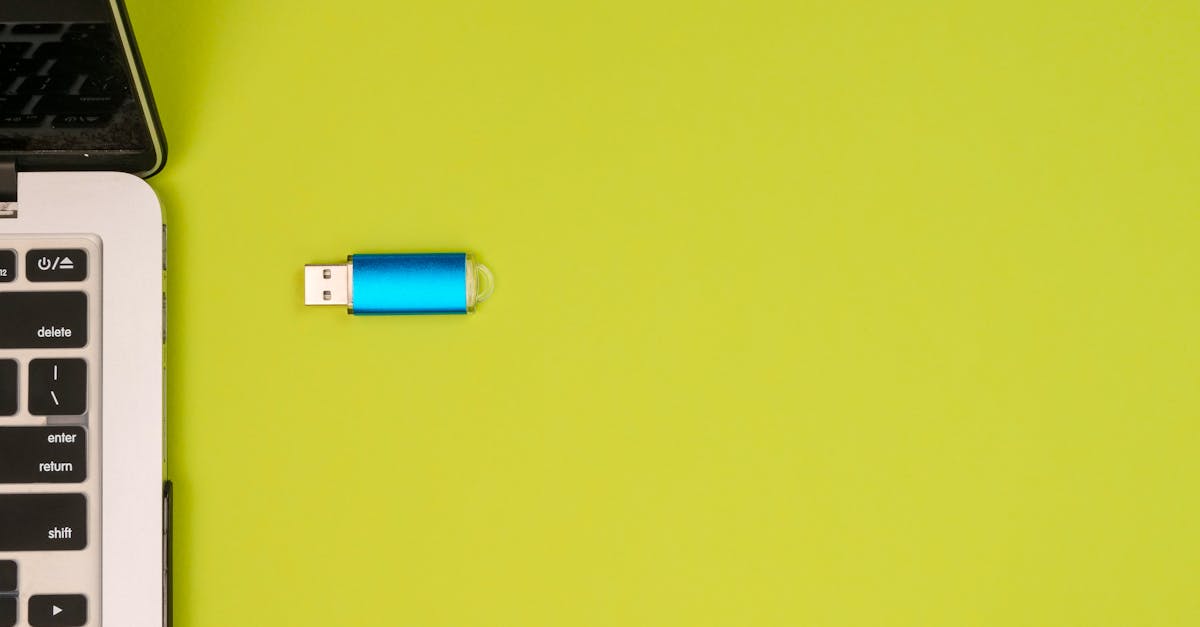 A laptop and external drive representing offsite backup storage.