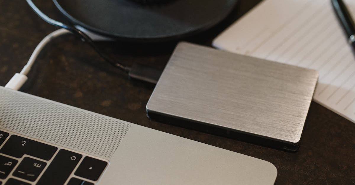 A calendar and laptop used to plan a WordPress backup schedule.